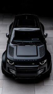 Black car wallpaper with dramatic lighting