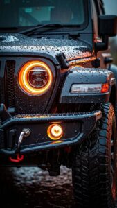 Black car wallpaper featuring a sleek sports car at night