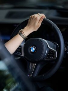 BMW car wallpaper with urban skyline